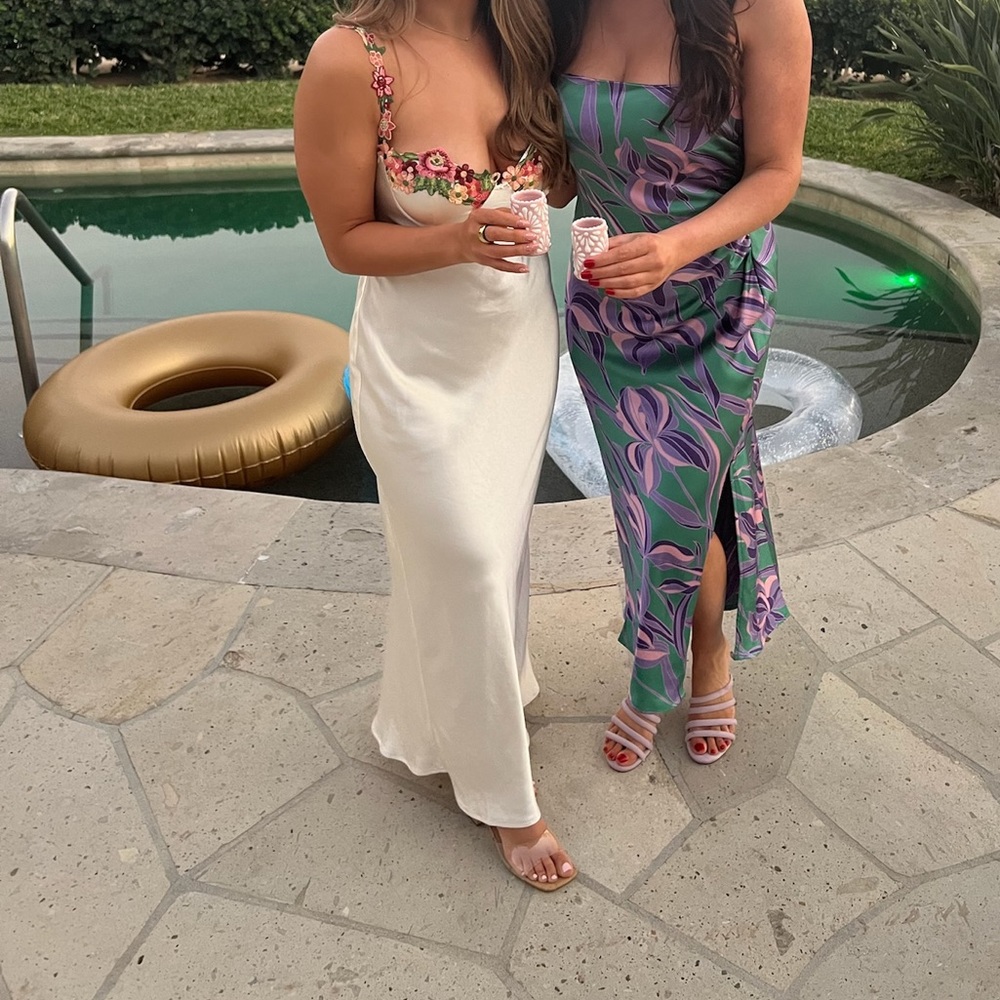 White dress with floral detailing on top